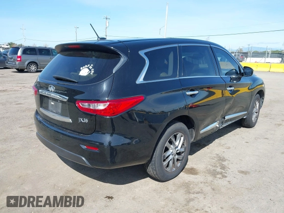 2013 Infiniti JX35 with VIN 5N1AL0MN5DC324112, listed as a IAAI auction lot 41794165 with 129,324 mi miles. Bid and sale history available at carsss.com. Image 4.