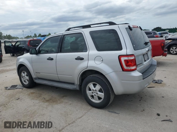 2008 Ford Escape XLS with VIN 1FMCU02Z88KE22266, listed as a Copart auction lot 63067385 with 214,026 mi miles and Salvage title. Bid and sale history available at DreamBid. Image 2.