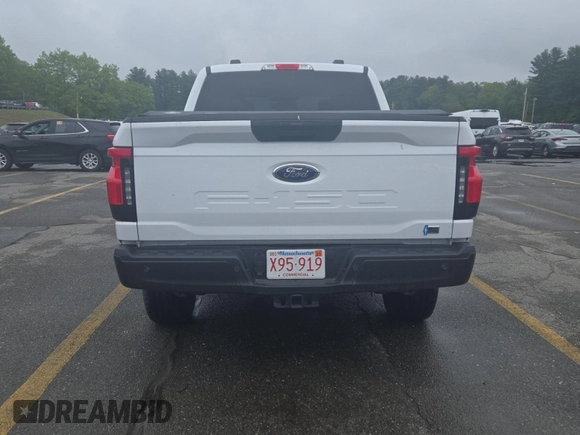 2023 Ford F-150 Lightning Pro z VIN 1FTVW1EL0PWG02840, wystawiony jako IAAI lot #42379448 z przebiegiem 52 710 mil mil oraz . Historia ofert i sprzedaży dostępna na DreamBid. Obrazek 35.