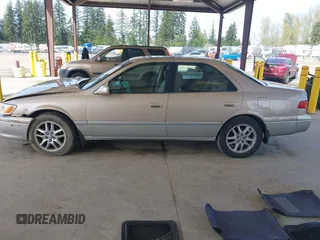 2001 Toyota Camry LE z VIN JT2BF28K110320365, wystawiony jako IAAI lot #41993343 z przebiegiem 211 458 mil mil oraz . Historia ofert i sprzedaży dostępna na DreamBid. Obrazek 14.