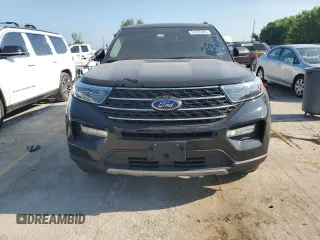 2023 Ford Explorer XLT with VIN 1FMSK8DH7PGB08372, listed as a Copart auction lot 62395205 with 63,257 mi miles and Salvage title. Bid and sale history available at DreamBid. Image 5.