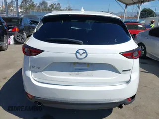 2020 Mazda CX-5 Grand Touring with VIN JM3KFADM0L1838495, listed as a IAAI auction lot 41991566 with 32,021 mi miles. Bid and sale history available at carsss.com. Image 16.