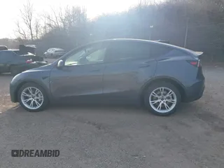 2023 Tesla Model Y Long Range with VIN 7SAYGAEEXPF612231, listed as a IAAI auction lot 41758243 with 32,924 mi miles and . Bid and sale history available at DreamBid. Image 15.