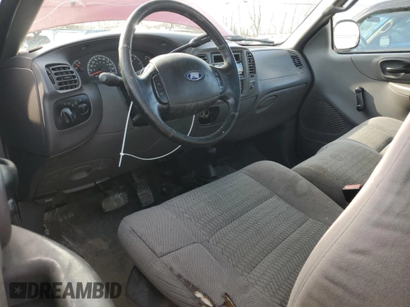 2002 Ford F-150 with VIN 2FTRF08292CA22313, listed as a Copart auction lot 46570775 with 162,051 mi miles and Salvage title. Bid and sale history available at DreamBid. Image 8.