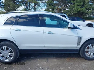 2014 Cadillac SRX Luxury Collection with VIN 3GYFNBE35ES581743, listed as a IAAI auction lot 41995293 with 140,987 mi miles. Bid and sale history available at carsss.com. Image 14.