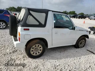 1994 Suzuki Sidekick z VIN 2S3TA01C8R6408593, wystawiony jako Copart lot #65011514 z przebiegiem 248 814 mil mil oraz Tytuł czysty. Historia ofert i sprzedaży dostępna na DreamBid. Obrazek 3.