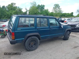 1996 Jeep Cherokee SE z VIN 1J4FJ28S8TL285634, wystawiony jako IAAI lot #42183816 z przebiegiem 260 237 mil mil oraz . Historia ofert i sprzedaży dostępna na DreamBid. Obrazek 13.