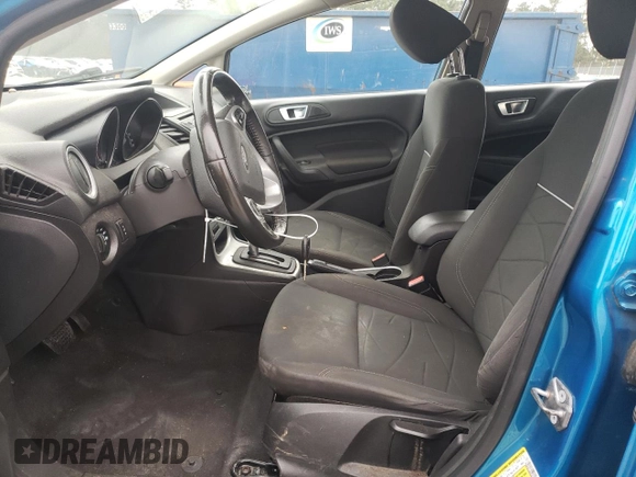 2014 Ford Fiesta SE z VIN 3FADP4EJ3EM232818, wystawiony jako Copart lot #42742745 z przebiegiem 122 987 mil mil oraz Szkoda całkowita • Salvage title. Historia ofert i sprzedaży dostępna na DreamBid. Obrazek 7.