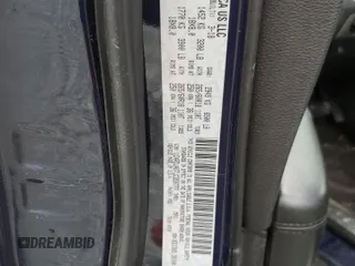 2018 Dodge Durango SXT z VIN 1C4RDJAG7JC359777, wystawiony jako Copart lot #57051685 z przebiegiem 134 568 mil mil oraz Szkoda całkowita • Salvage title. Historia ofert i sprzedaży dostępna na DreamBid. Obrazek 14.