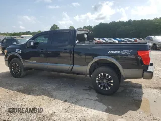 2016 Nissan Titan Platinum Reserve with VIN 1N6BA1F40GN512437, listed as a Copart auction lot 63521325 with 203,879 mi miles and Clean title. Bid and sale history available at DreamBid. Image 2.