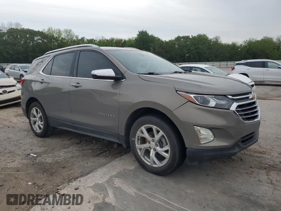 2019 Chevrolet Equinox Premier with VIN 3GNAXNEV8KS561549, listed as a Copart auction lot 54332695 with 124,774 mi miles and Salvage title. Bid and sale history available at DreamBid. Image 4.