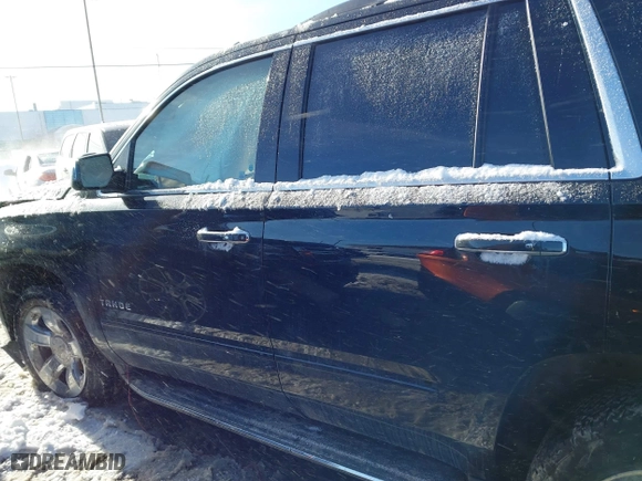 2016 Chevrolet Tahoe LTZ with VIN 1GNSKCKCXGR274864, listed as a IAAI auction lot 41428433 with 117,365 mi miles. Bid and sale history available at carsss.com. Image 14.
