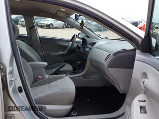 2009 Toyota Corolla with VIN 1NXBU40E49Z086415, listed as a IAAI auction lot 39773955 with 203,803 mi miles and . Bid and sale history available at DreamBid. Image 5.