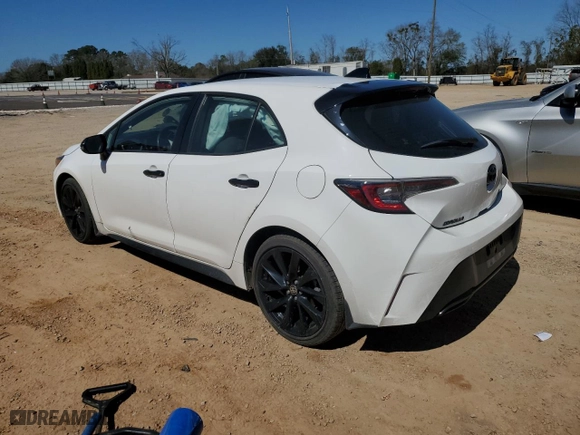 2021 Toyota Corolla Hatchback SE with VIN JTND4MBE4M3132376, listed as a Copart auction lot 47357005 with 104,713 mi miles and Salvage Title. Bid and sale history available at carsss.com. Image 2.