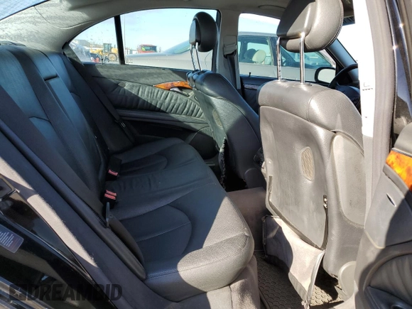 2004 Mercedes-Benz E-Class 5.0L with VIN WDBUF70J64A585084, listed as a Copart auction lot 80297124 with 233,638 mi miles and Salvage Title. Bid and sale history available at carsss.com. Image 10.