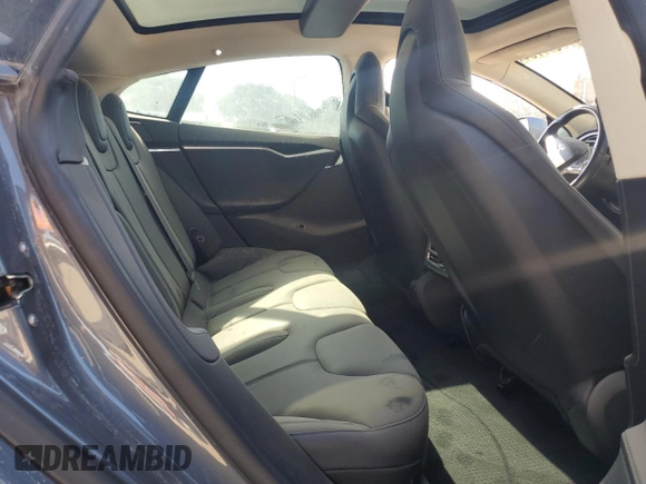 2013 Tesla Model S with VIN 5YJSA1CG9DFP09733, listed as a Copart auction lot 71574474 with 88,163 mi miles and Salvage title. Bid and sale history available at DreamBid. Image 10.