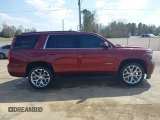 2019 Chevrolet Tahoe LT z VIN 1GNSCBKC9KR102552, wystawiony jako IAAI lot #41792517 z przebiegiem 92 856 mil mil oraz . Historia ofert i sprzedaży dostępna na DreamBid. Obrazek 13.