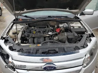 2012 Ford Fusion SEL z VIN 3FAHP0JA3CR156338, wystawiony jako Copart lot #51996885 z przebiegiem 162 892 mil mil oraz Szkoda całkowita • Salvage title. Historia ofert i sprzedaży dostępna na DreamBid. Obrazek 11.