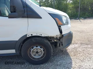 2015 Ford Transit Cargo z VIN 1FTNE1ZM4FKB15801, wystawiony jako IAAI lot #42674219 z przebiegiem 228 634 mil mil oraz . Historia ofert i sprzedaży dostępna na DreamBid. Obrazek 17.