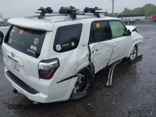 2015 Toyota 4Runner SR5 with VIN JTEZU5JR1F5100542, listed as a IAAI auction lot 42357246 with Not provided miles and . Bid and sale history available at DreamBid. Image 4.