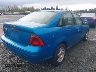 2007 Ford Focus S with VIN 1FAHP34N27W161713, listed as a IAAI auction lot 41966335 with 154,007 mi miles and . Bid and sale history available at carsss.com. Image 4.