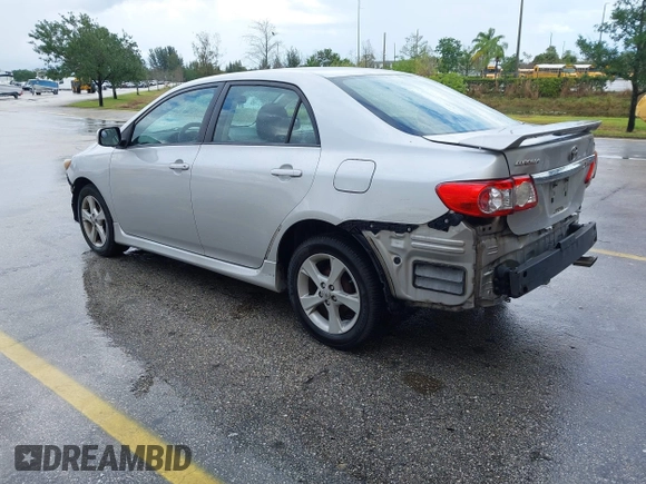 2013 Toyota Corolla L with VIN 5YFBU4EE7DP209207, listed as a IAAI auction lot 41990086 with 168,269 mi miles. Bid and sale history available at carsss.com. Image 3.