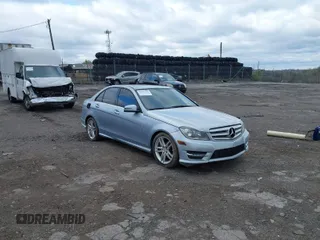 2013 Mercedes-Benz C-Class C 250 Sport with VIN WDDGF4HB5DR259732, listed as a IAAI auction lot 42054402 with 100,655 mi miles. Bid and sale history available at carsss.com. Image 1.