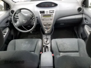2012 Toyota Yaris with VIN JTDBT4K38CL036729, listed as a Copart auction lot 53514995 with 232,180 mi miles and Salvage Title. Bid and sale history available at DreamBid. Image 8.