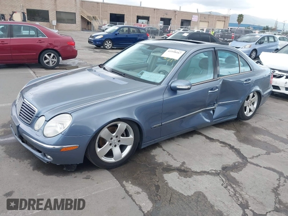 2003 Mercedes-Benz E-Class 3.2L with VIN WDBUF65JX3A144611, listed as a IAAI auction lot 41938167 with 1 mi miles. Bid and sale history available at carsss.com. Image 18.