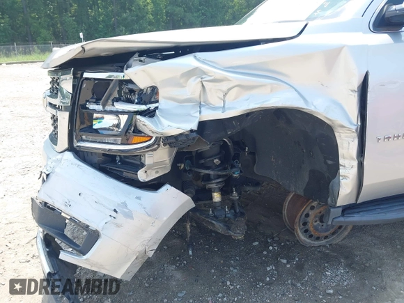 2019 Chevrolet Tahoe LT with VIN 1GNSKBKC8KR363433, listed as a IAAI auction lot 42567045 with 122,956 mi miles and . Bid and sale history available at DreamBid. Image 5.