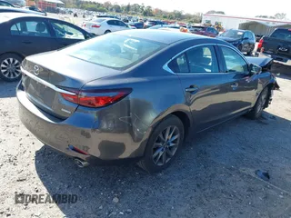 2020 Mazda 6 Sport with VIN JM1GL1UM7L1527203, listed as a IAAI auction lot 41378087 with 57,174 mi miles and . Bid and sale history available at DreamBid. Image 4.