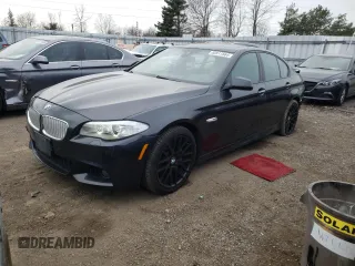 2013 BMW 5 Series 550i xDrive with VIN WBAFU9C55DDY71255, listed as a Copart auction lot 82611564 with 141,916 mi miles and Salvage title. Bid and sale history available at DreamBid. Image 1.