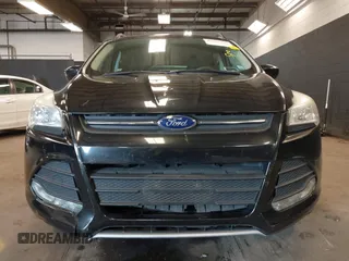 2014 Ford Escape SE with VIN 1FMCU0GX6EUE31877, listed as a IAAI auction lot 42080730 with 71,251 mi miles. Bid and sale history available at carsss.com. Image 6.