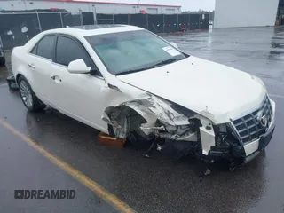 2013 Cadillac CTS Luxury z VIN 1G6DG5E56D0162030, wystawiony jako IAAI lot #41758009 z przebiegiem 207 371 mil mil oraz . Historia ofert i sprzedaży dostępna na DreamBid. Obrazek 1.
