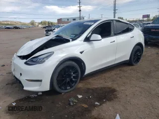 2021 Tesla Model Y Long Range z VIN 5YJYGDEE8MF207009, wystawiony jako Copart lot #54235755 z przebiegiem Nie podano mil oraz Czysty tytuł • Clean title. Historia ofert i sprzedaży dostępna na DreamBid. Obrazek 1.