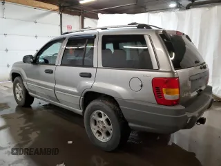 1999 Jeep Grand Cherokee Laredo with VIN 1J4GW58N0XC686845, listed as a Copart auction lot 48877805 with 155,908 mi miles and Clean title. Bid and sale history available at DreamBid. Image 2.