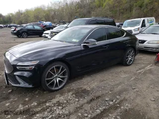 2022 Genesis G70 2.0T with VIN KMTG34TA0NU103227, listed as a Copart auction lot 48777013 with 15,901 mi miles. Bid and sale history available at carsss.com. Image 1.