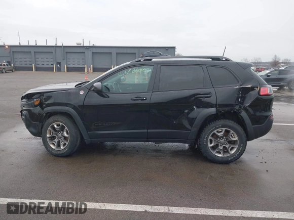 2019 Jeep Cherokee Trailhawk Elite with VIN 1C4PJMBX6KD418409, listed as a IAAI auction lot 41178690 with 80,755 mi miles. Bid and sale history available at carsss.com. Image 14.