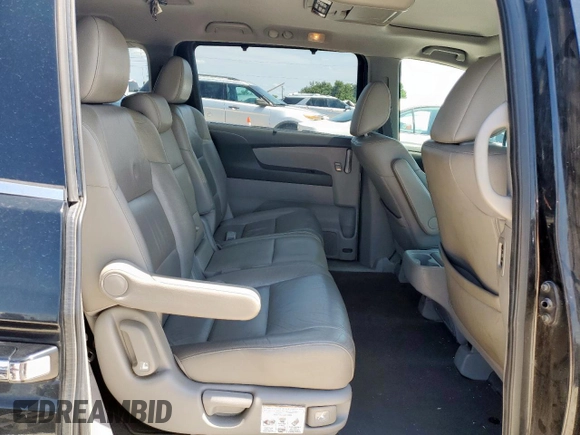 2011 Honda Odyssey Touring with VIN 5FNRL5H90BB033700, listed as a Copart auction lot 58602835 with 197,063 mi miles and Clean title. Bid and sale history available at DreamBid. Image 11.