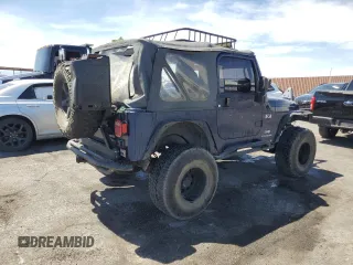 2004 Jeep Wrangler X with VIN 1J4FA39S64P721072, listed as a Copart auction lot 57512865 with Not provided miles and Clean title. Bid and sale history available at DreamBid. Image 3.