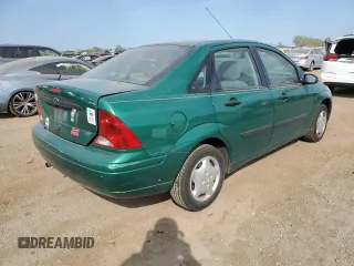 2002 Ford Focus LX with VIN 1FAFP33PX2W150929, listed as a Copart auction lot 71664474 with 61,505 mi miles and Salvage Title. Bid and sale history available at DreamBid. Image 3.