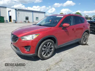 2016 Mazda CX-5 Grand Touring z VIN JM3KE2DY1G0645327, wystawiony jako Copart lot #54359185 z przebiegiem 105 617 mil mil oraz Nie do naprawy • Non repairable. Historia ofert i sprzedaży dostępna na DreamBid. Obrazek 1.