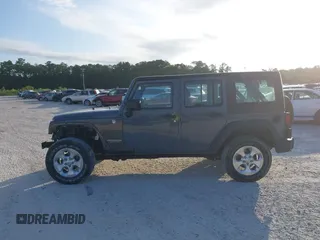 2014 Jeep Wrangler Unlimited Sport with VIN 1C4BJWDG5EL327225, listed as a IAAI auction lot 42547991 with 129,545 mi miles and . Bid and sale history available at DreamBid. Image 14.