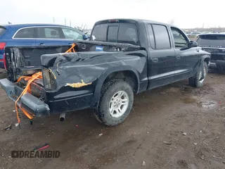 2004 Dodge Dakota Sport with VIN 1D7HL38N94S538692, listed as a IAAI auction lot 41843739 with 198,719 mi miles. Bid and sale history available at carsss.com. Image 4.