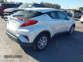 2019 Toyota C-HR XLE with VIN JTNKHMBX4K1058916, listed as a IAAI auction lot 41296963 with 113,290 mi miles. Bid and sale history available at carsss.com. Image 4.
