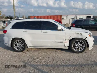 2016 Jeep Grand Cherokee Summit with VIN 1C4RJFJG3GC318626, listed as a IAAI auction lot 40737019 with 92,880 mi miles and . Bid and sale history available at DreamBid. Image 13.