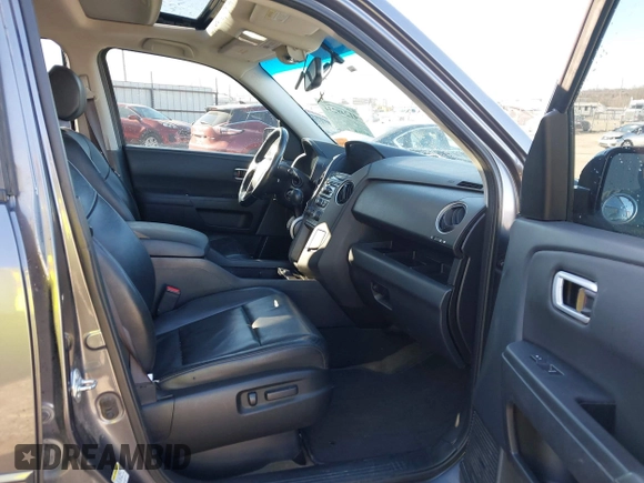 2015 Honda Pilot EX-L with VIN 5FNYF4H57FB063115, listed as a IAAI auction lot 41248234 with 187,752 mi miles and . Bid and sale history available at carsss.com. Image 5.