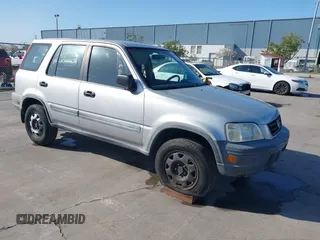 2001 Honda CR-V LX z VIN JHLRD28481S017409, wystawiony jako IAAI lot #41943942 z przebiegiem 134 999 mil mil oraz . Historia ofert i sprzedaży dostępna na DreamBid. Obrazek 1.