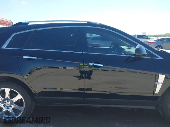 2012 Cadillac SRX Performance Collection with VIN 3GYFNBE30CS658628, listed as a IAAI auction lot 41968266 with 113,810 mi miles. Bid and sale history available at carsss.com. Image 13.
