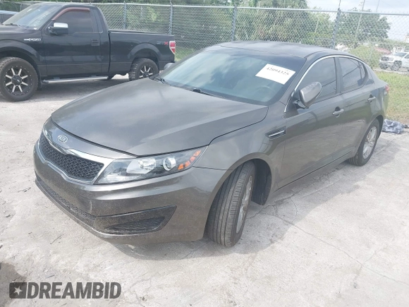 2011 Kia Optima LX with VIN KNAGM4A70B5162915, listed as a IAAI auction lot 42094325 with 156,169 mi miles and . Bid and sale history available at carsss.com. Image 2.